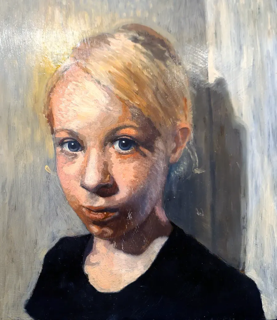 Portrait of a young girl with blonde hair and blue eyes in a black top